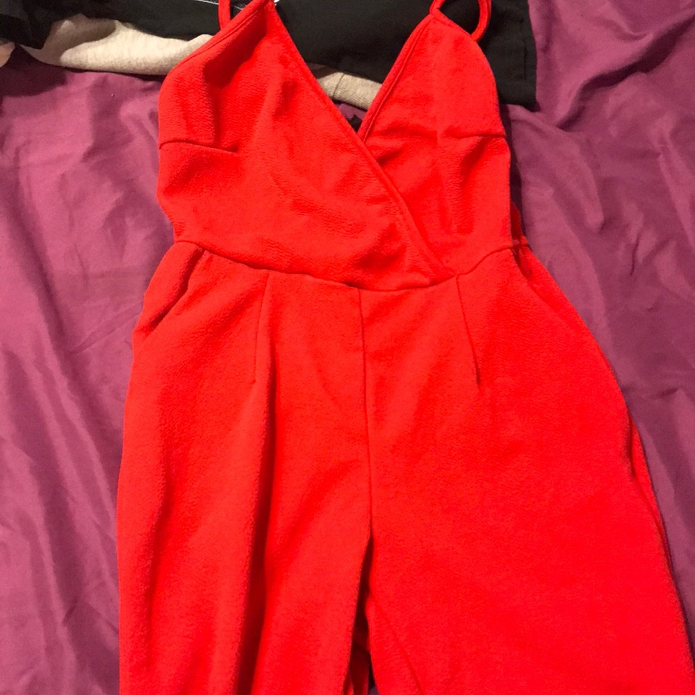 Red jump suit